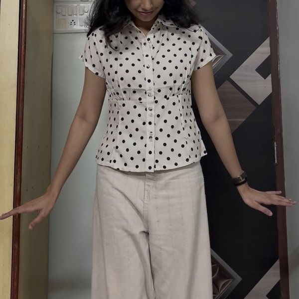 Polka dot peplum shirt